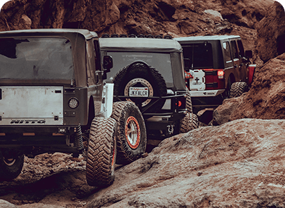 3 jeeps off roading