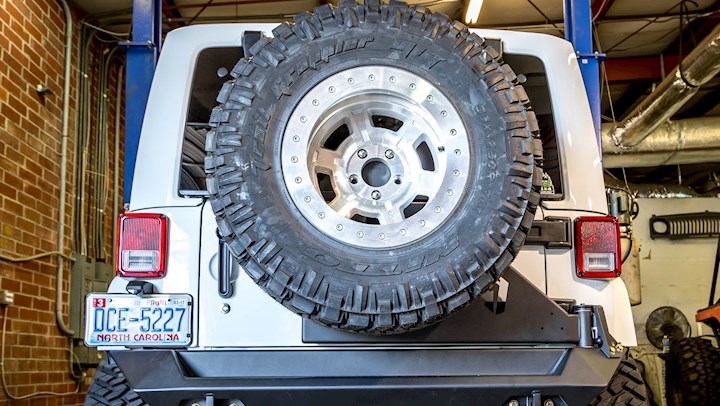 Fab Fours Jeep Wrangler JK Off-The-Gate Tire Carrier & Bumper Review  [Video] | DrivingLine