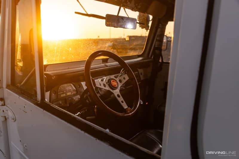 toyota fj40 truck parked at sunset