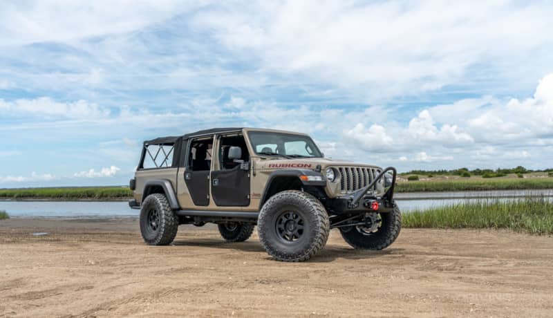Jeep Gladiator Rubicon gator color on 38s 3 inch lift bestop half doors evo front bumper