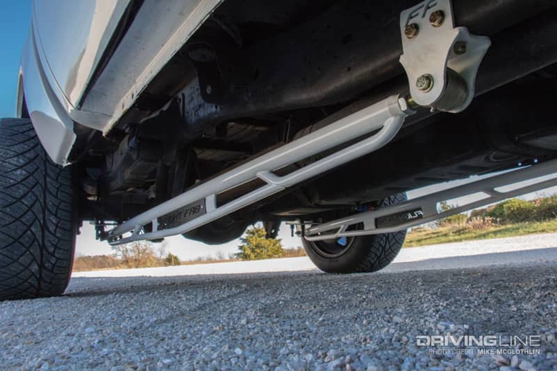 Traction bars underneath the truck