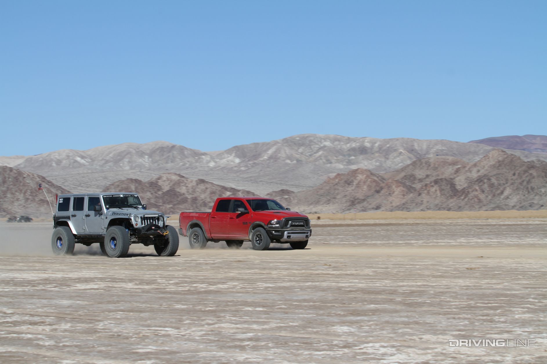 Driving Line – 2016 Ram Rebel 1500 – red pickup truck