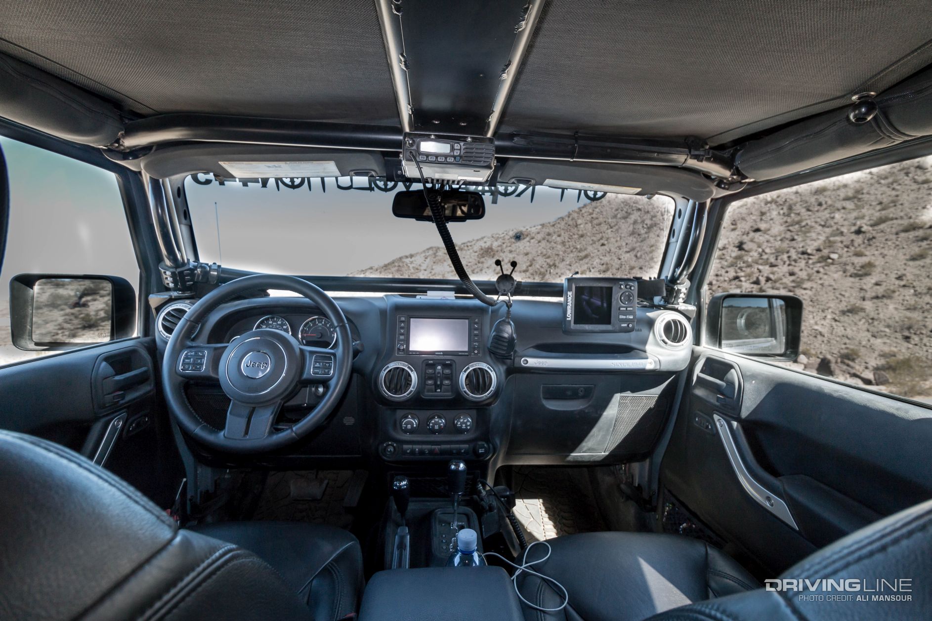 2014 Jeep Wrangler Unlimited Rubicon dual-purpose JK Evo with Rock Hard 4x4 cage and Lowrance Elite 5m Baja GPS