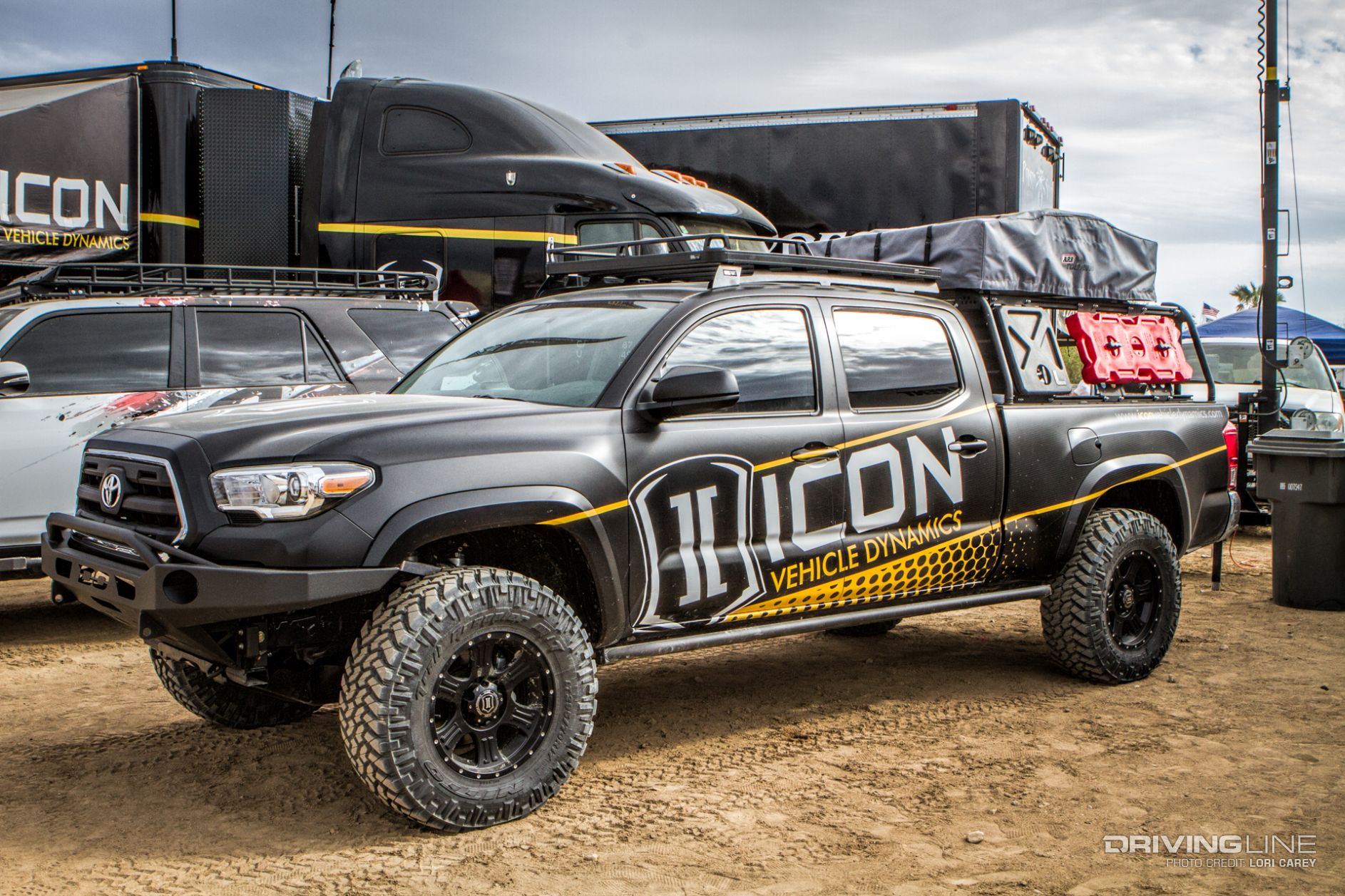 Toyota Tacoma on Nitto Trail Grapplers in vendor area at 54th annual Desert Safari by Icon Vehicle Dynamics