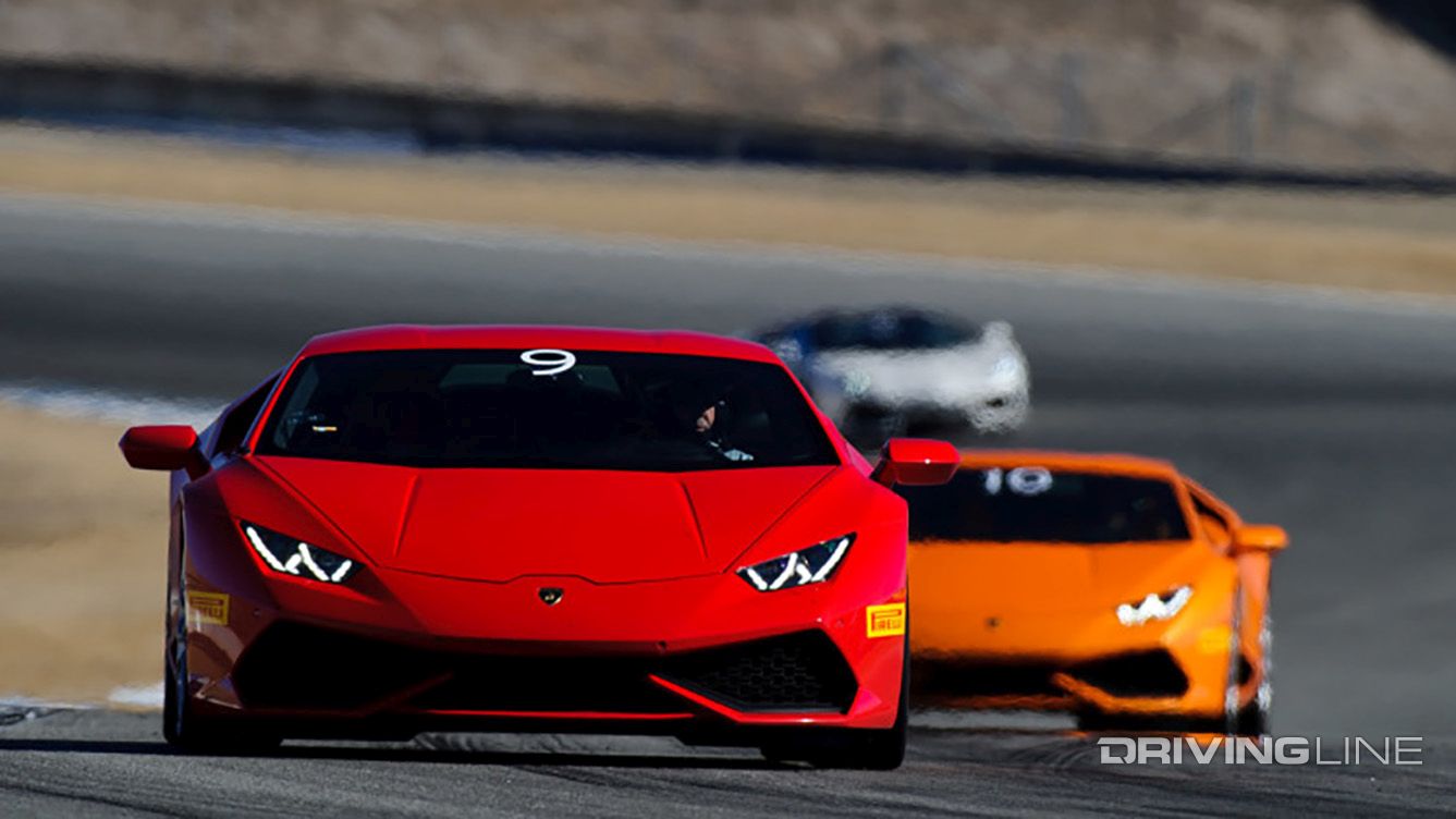 Fast Cars Supercar Membership Clubs - red and orange Lamborghini Huracáns