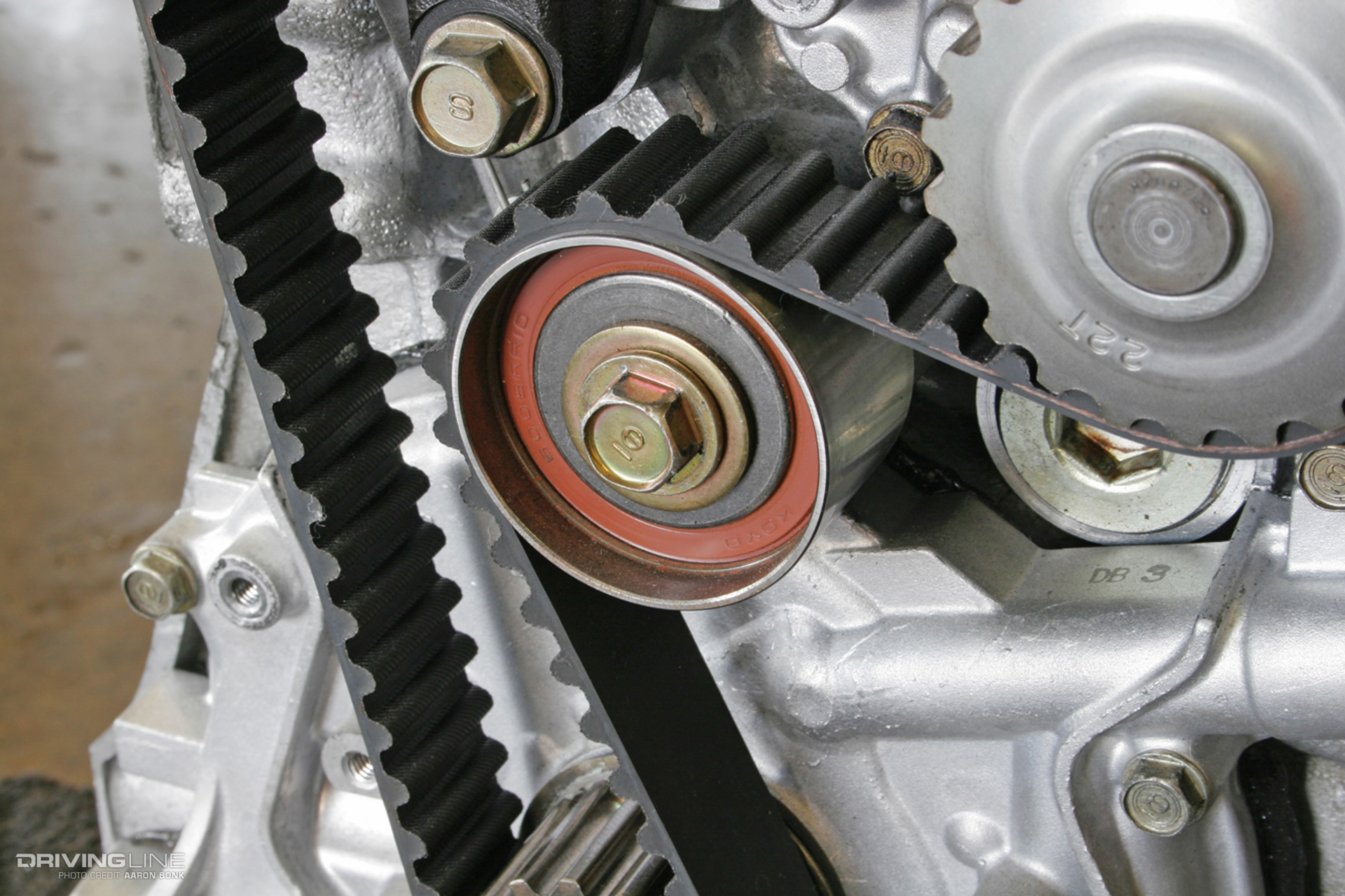 Belt with grooves on an engine