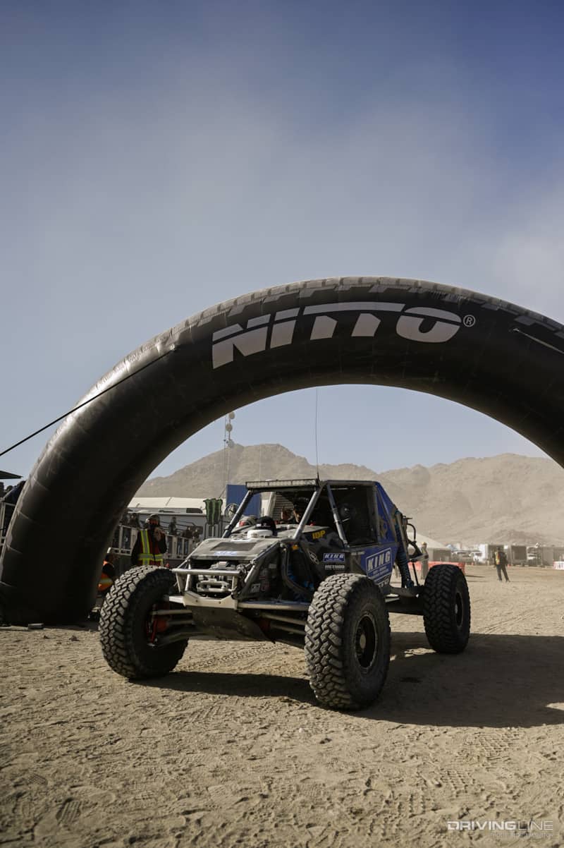 Raul Gomez at the finish line Nitto tire arch at the 2023 KOH Nitto Race of Kings