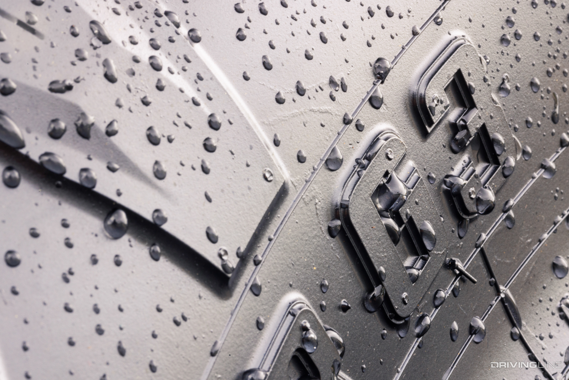 Nitto Terra Grappler G3 A/T Tire sidewall detail with water droplets