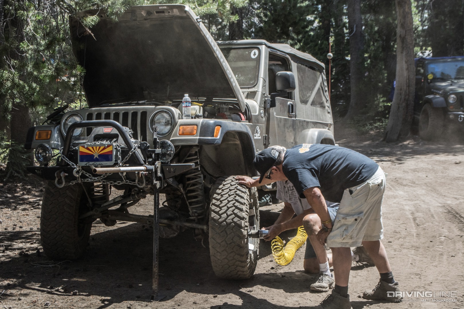 A Jamboree participant got help from Austin and Ron to fix his TJ