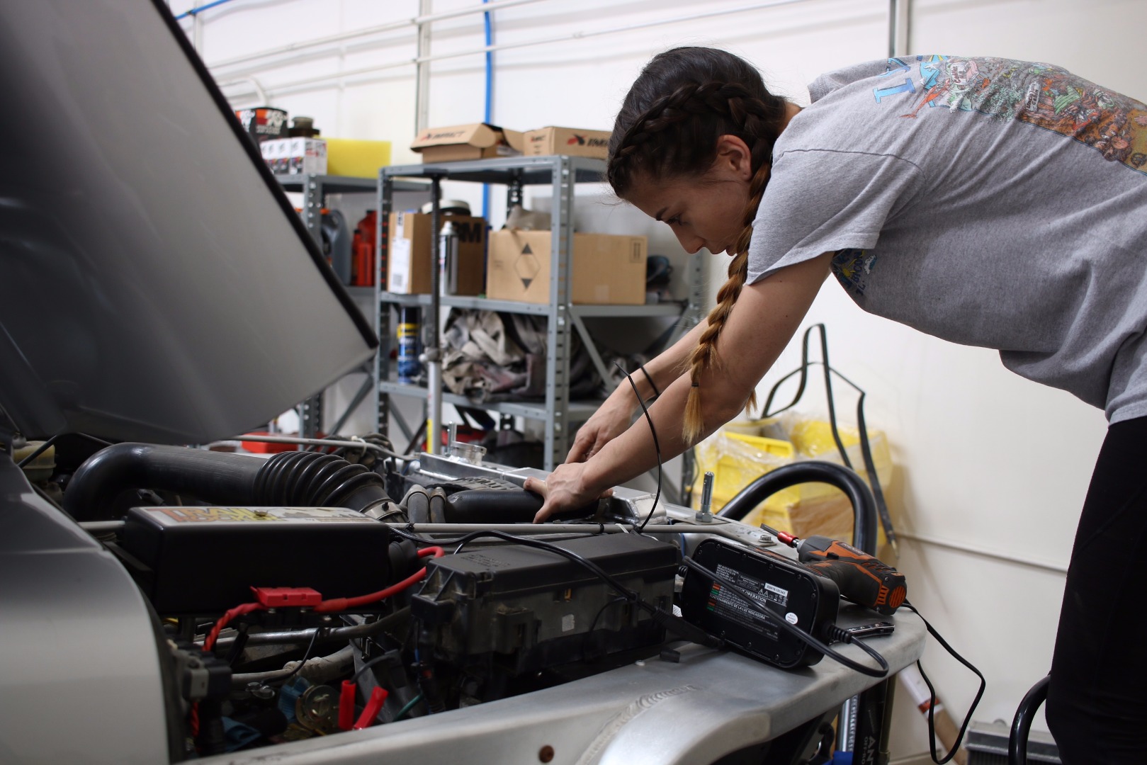 Courtney working under the hood