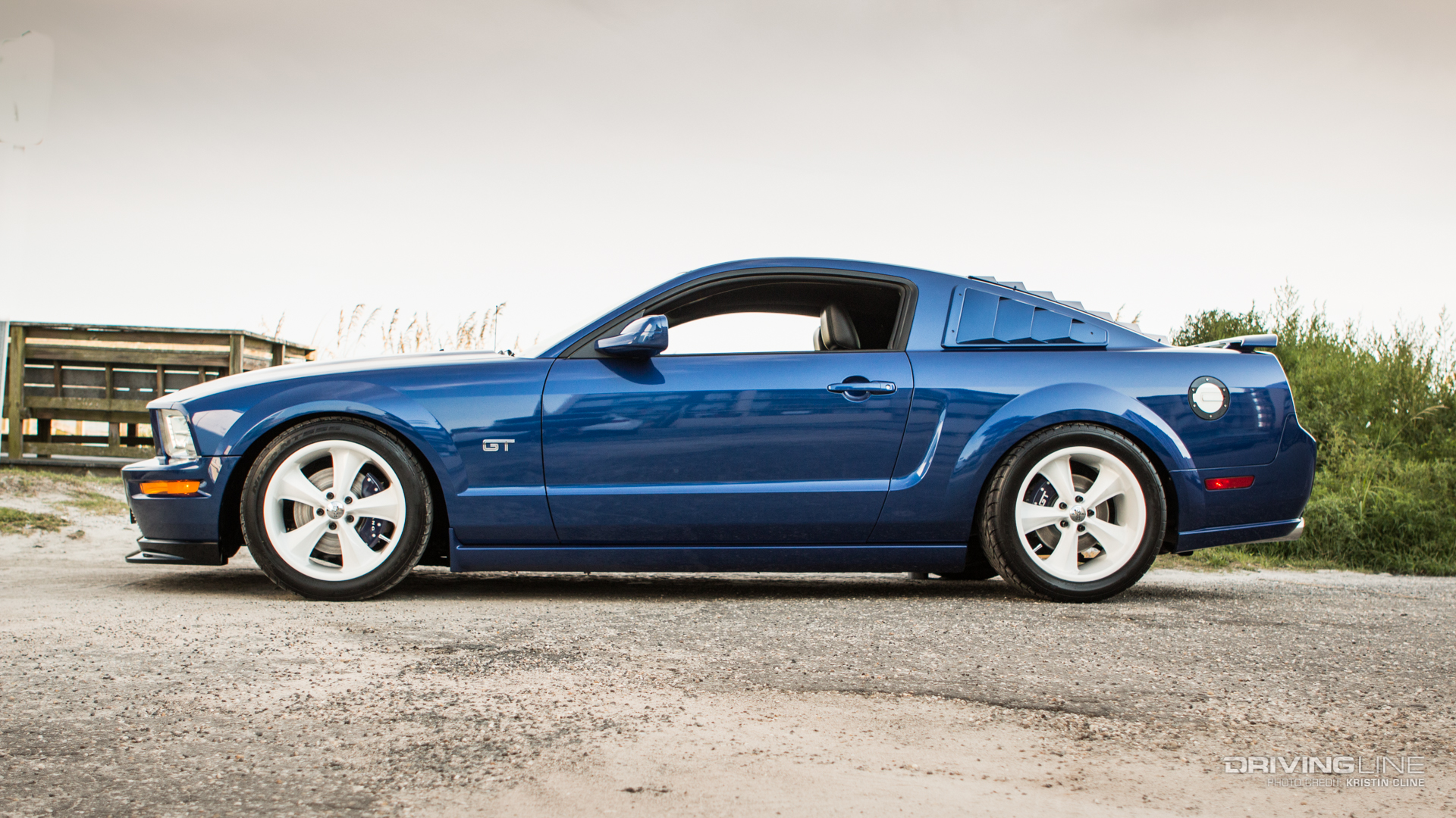 2005 Ford Mustang GT - blue with white wheels