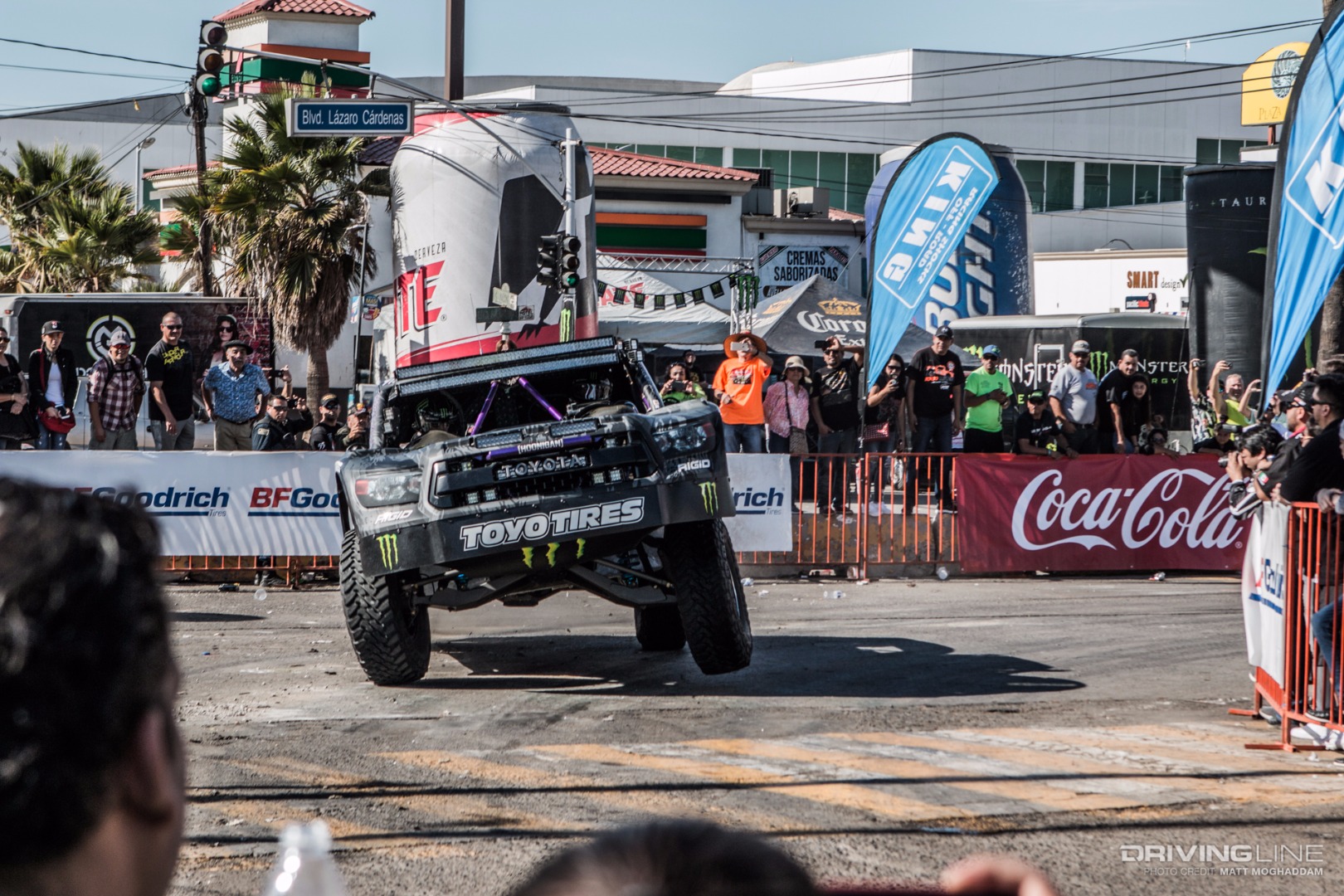 BJ Baldwin 3-wheeling his Trophy Truck around the first corner