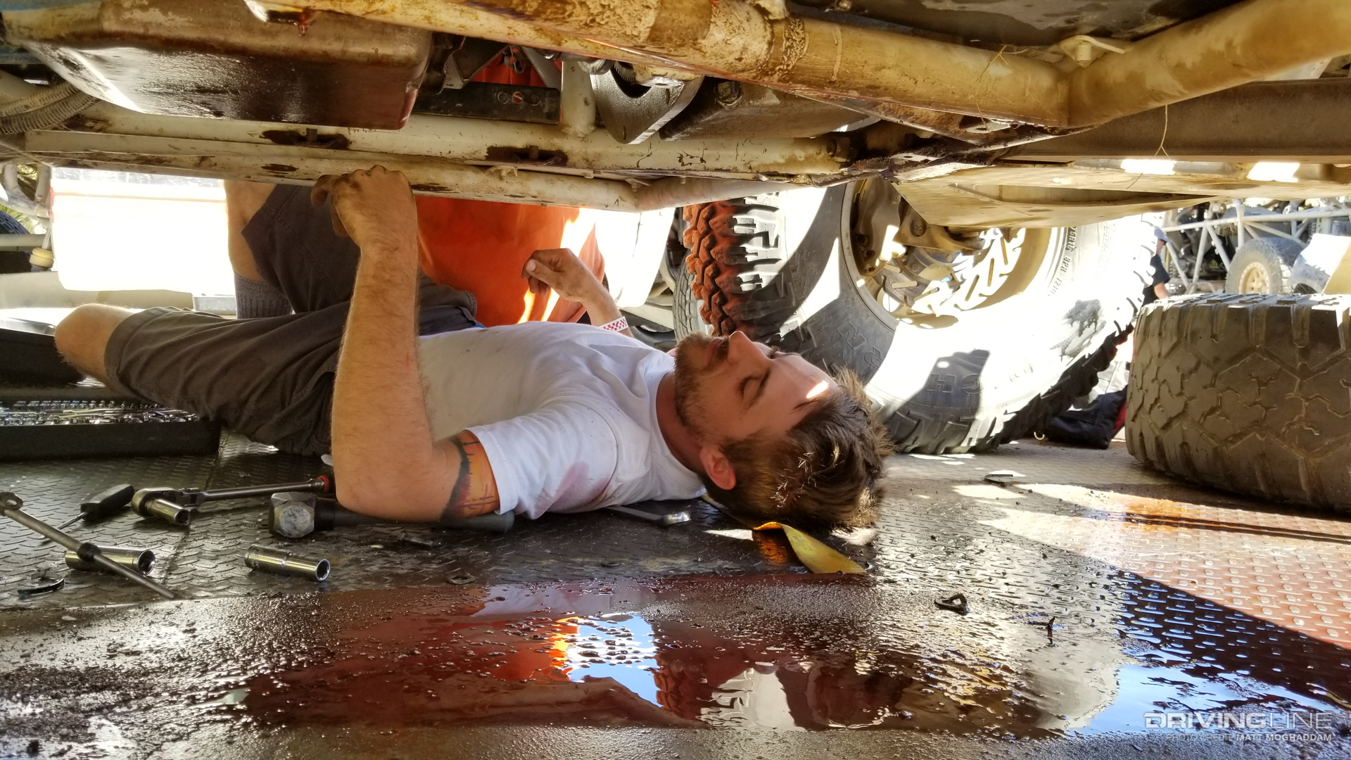 Kyle Wells working on the BajaLite's transmission in San Ignacio