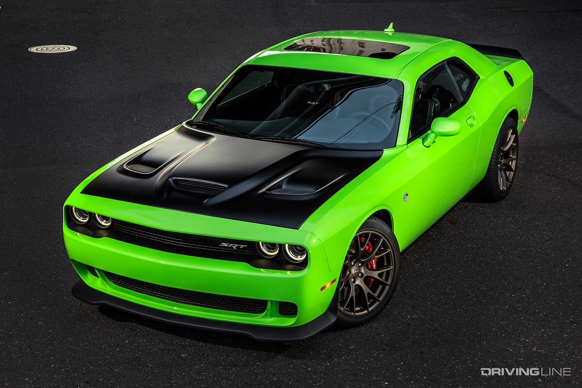 Green Challenger with a black hood
