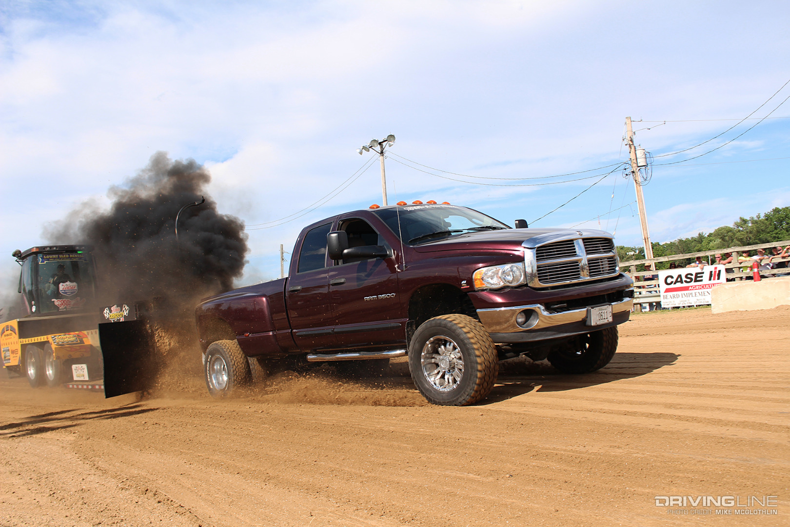 Dodge Ram 3500 with a Cummins pulling a sled