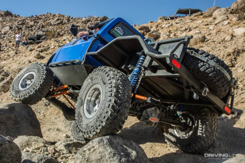 Matt's Chevy crawling up over rocks
