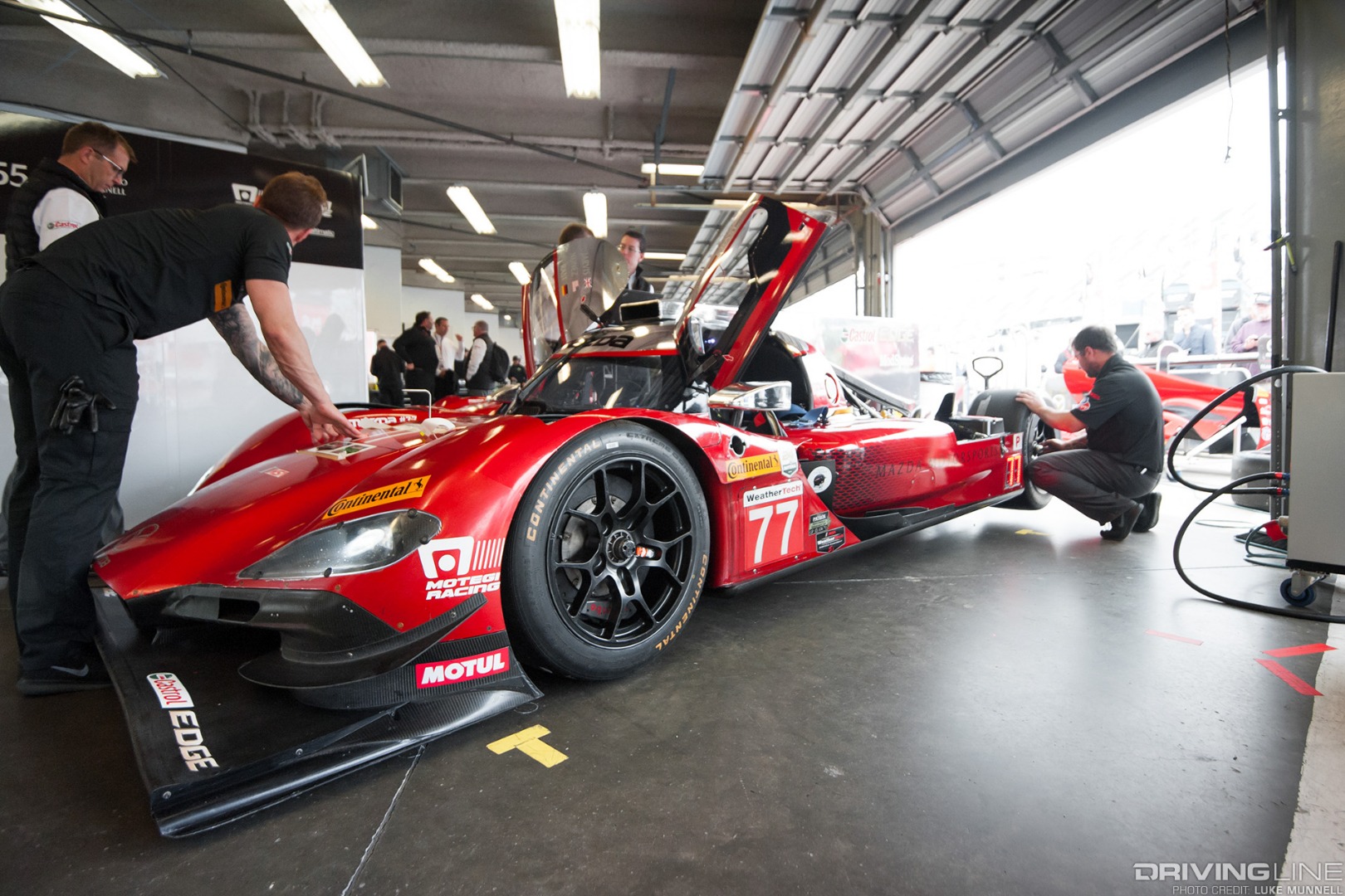 Mazda Team Joest pits at Rolex 24 Hours of Daytona RT24-P no. 77 car