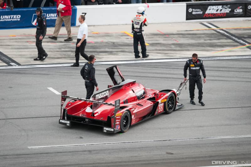 Mazda Team Joest pits at Rolex 24 Hours of Daytona RT24-P pit lane tire failure
