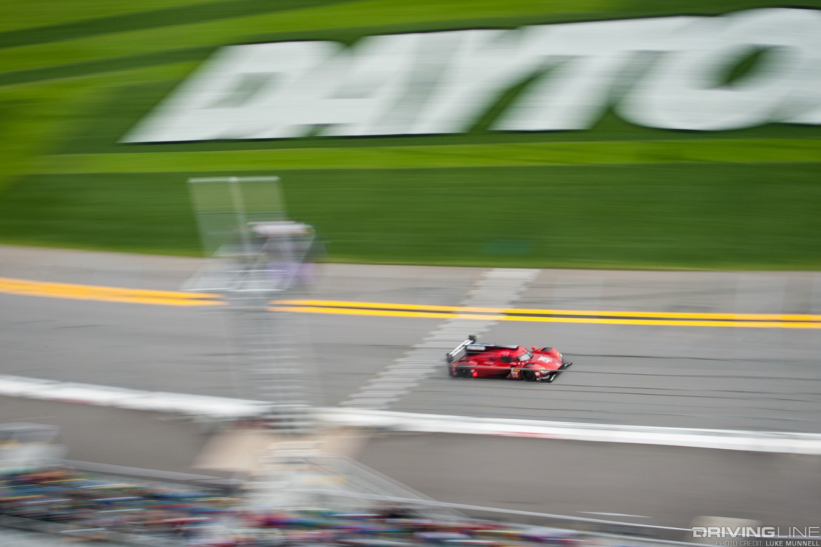 Mazda Team Joest at Rolex 24 Hours of Daytona RT24-P crossing the finish line overhead pan blur