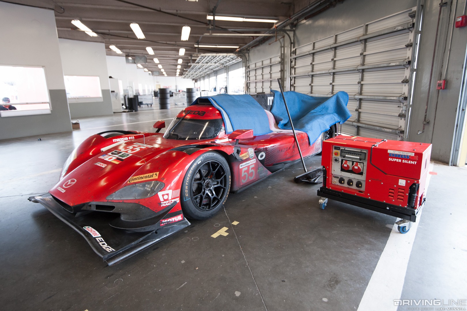 Mazda Team Joest at Rolex 24 Hours of Daytona RT24-P no. 55 car retired in pit garages