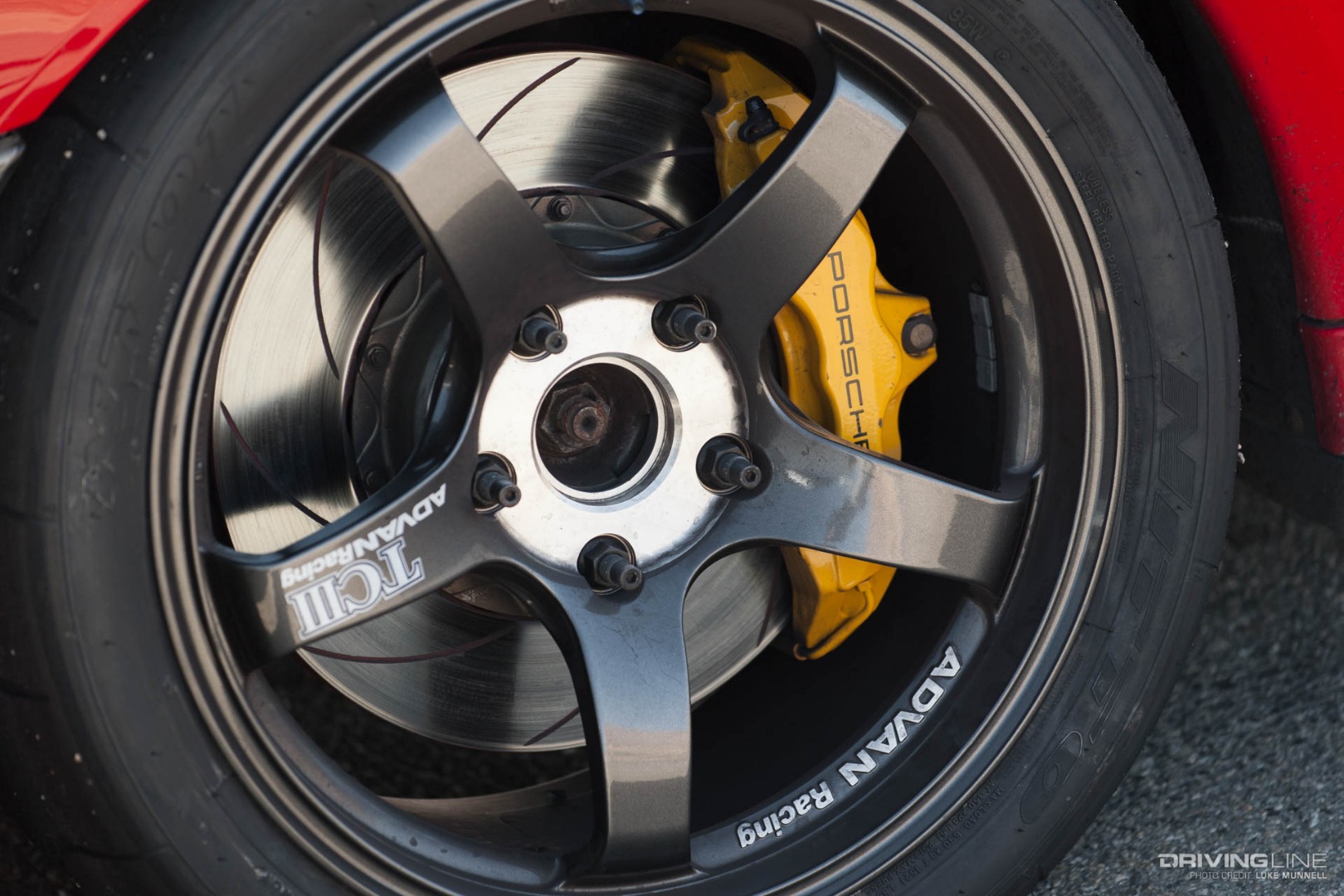 Driver Battles Porsche Wheel