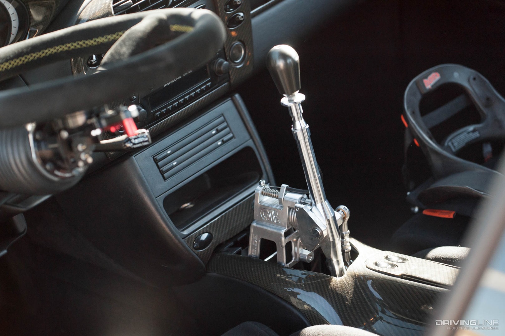 Driver Battles Porsche Interior