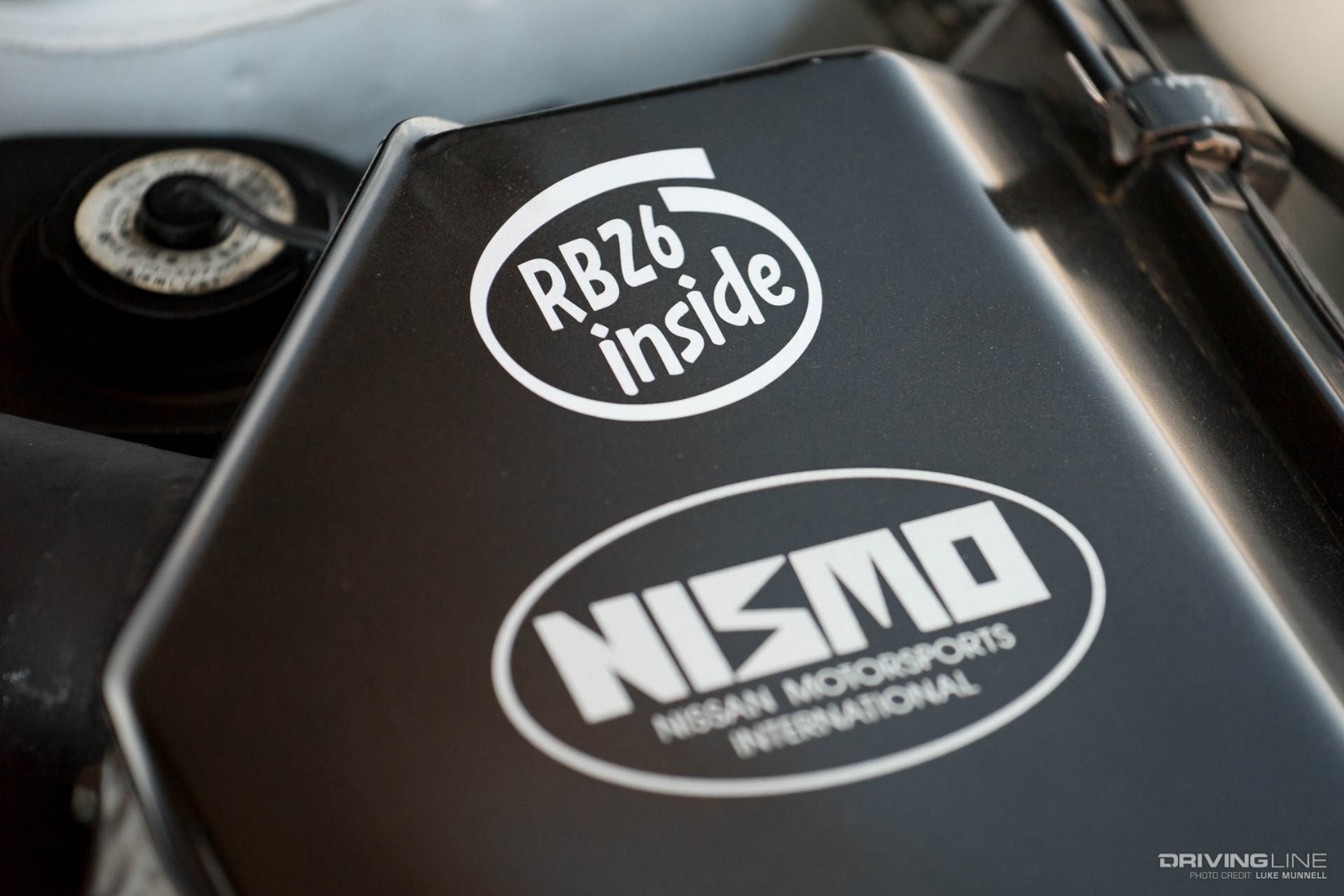 Driver Battles Nissan Engine