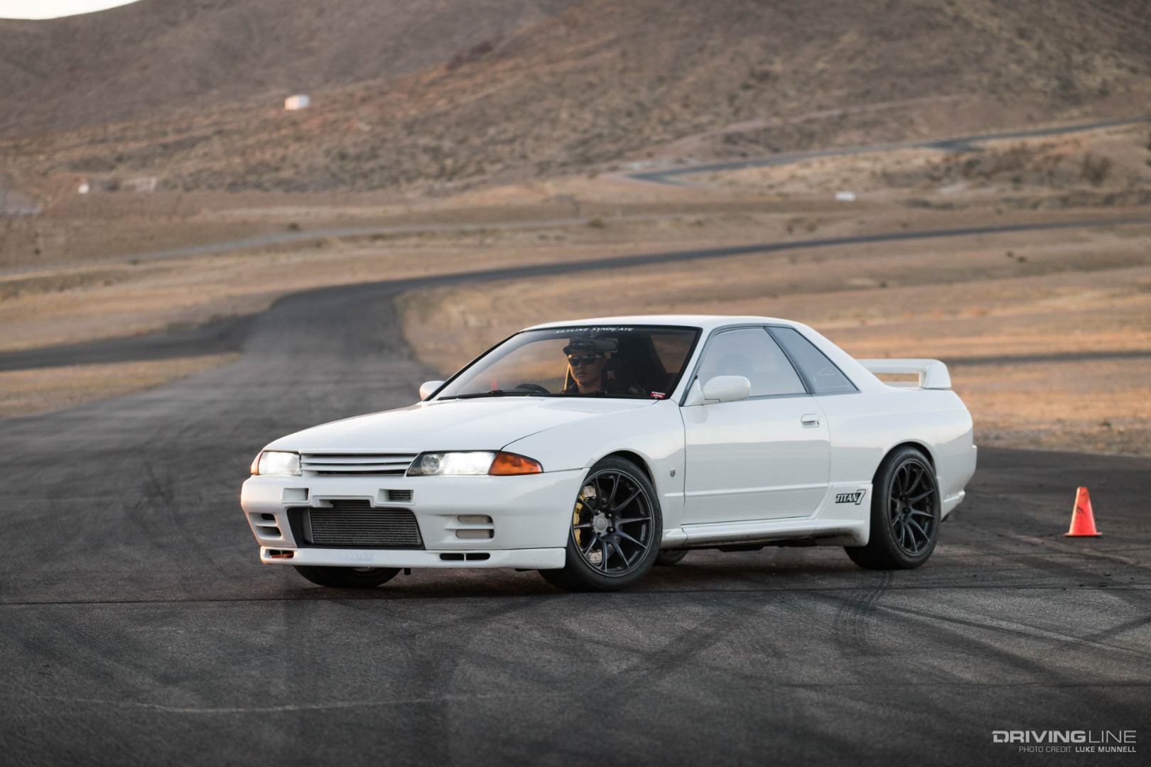 Driver Battles Nissan Solo