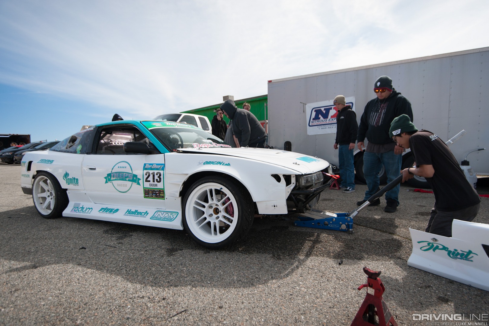 Top Drift round 1 SoCal pro-am drifting Shaun Doom white S13 Nissan 240SX fastback front shot