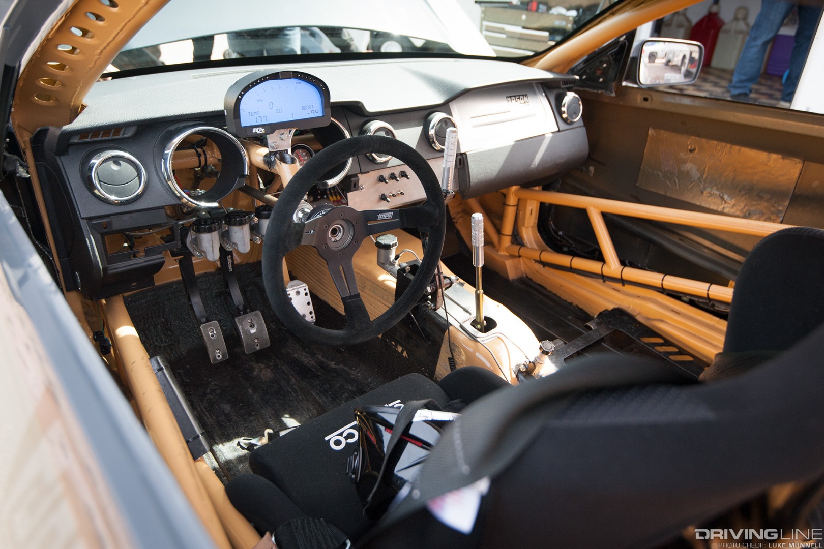 Top Drift round 1 SoCal pro-am drifting John Mason gray Ford Mustang GT drift car interior display steering wheel dash seats roll cage