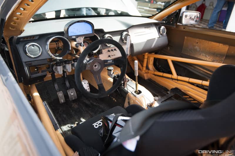 Top Drift round 1 SoCal pro-am drifting John Mason gray Ford Mustang GT drift car interior display steering wheel dash seats roll cage