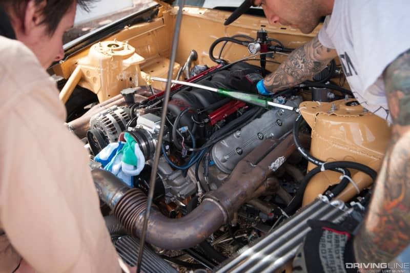 Top Drift round 1 SoCal pro-am drifting John Mason gray Ford Mustang GT drift car LS V8 engine bay