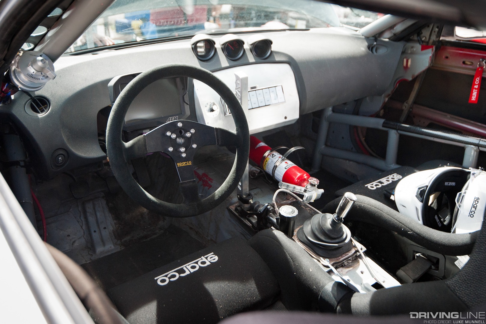 Top Drift round 1 SoCal pro-am drifting TJ Hunt Hunt & Co white Z33 Nissan 350Z interior dash steering wheel gauges