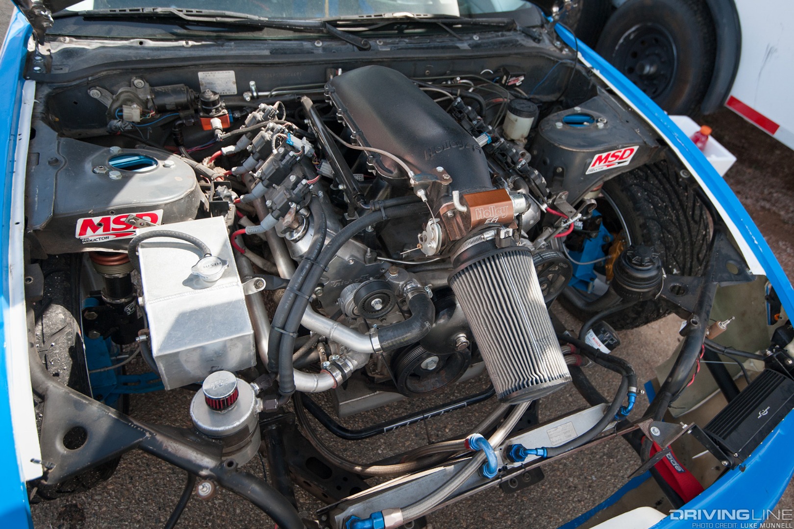 Top Drift round 1 SoCal pro-am drifting Samuel Guzman blue V8 S13 Nissan 240SX coupe V8 engine bay