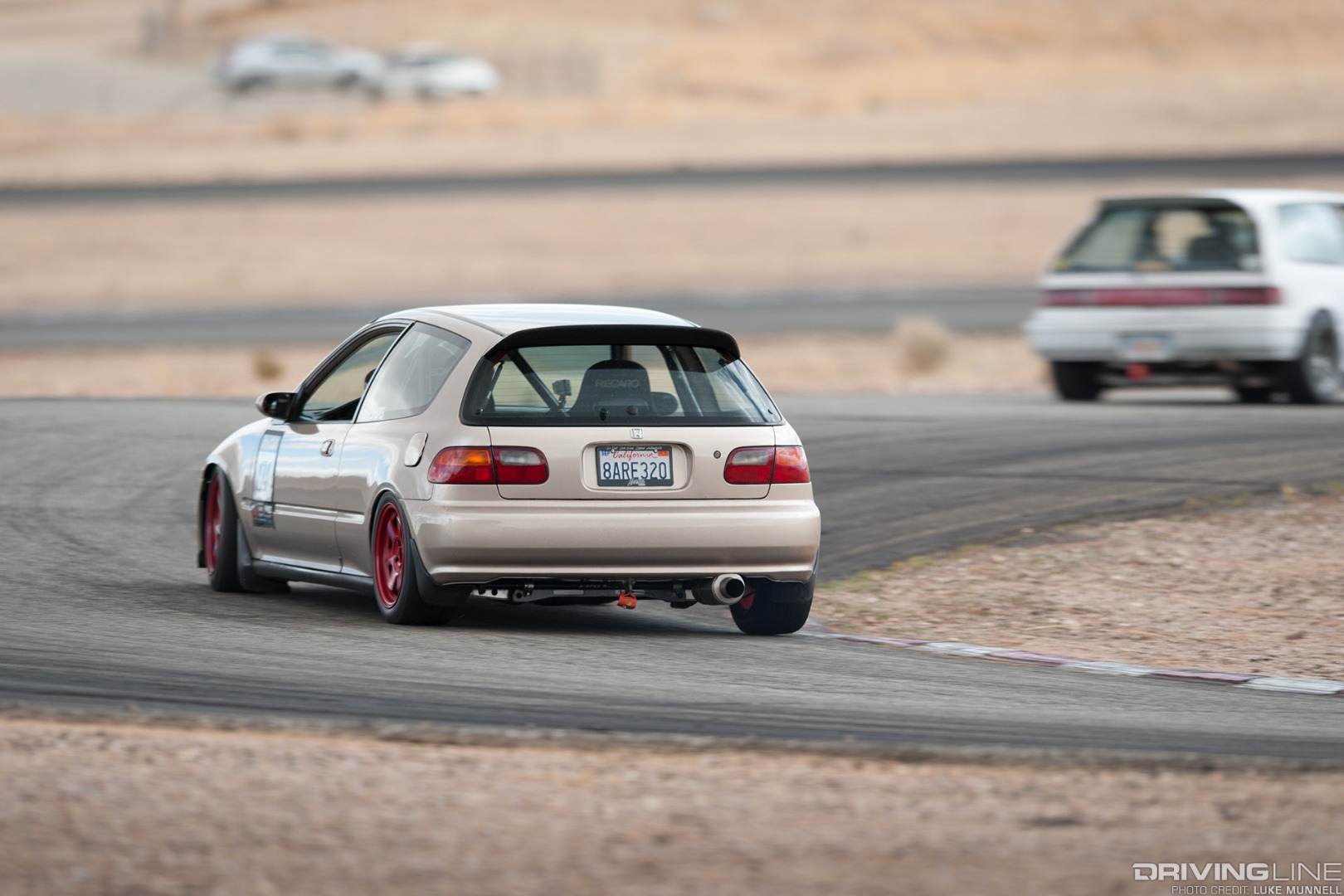 John Cruz Goldy EG Honda Civic hatchback rear track driving