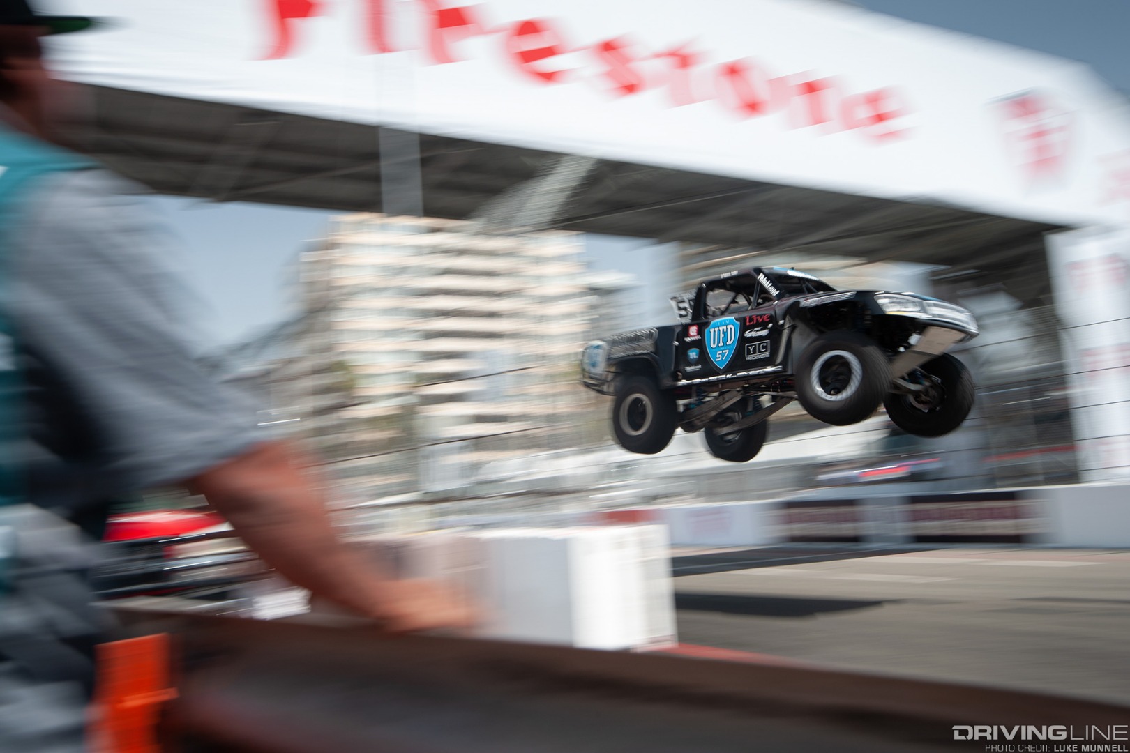 Stadium Super Trucks Formula Offroad Long Beach - flying truck and track worker
