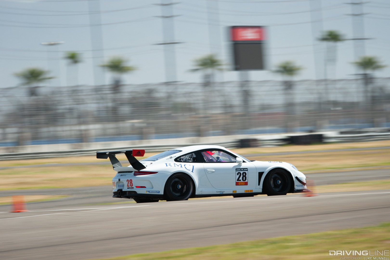 PCA California Festival of Speed at Auto Club Speedway GAS Motorsport no. 28 Porsche GT America side pan blur