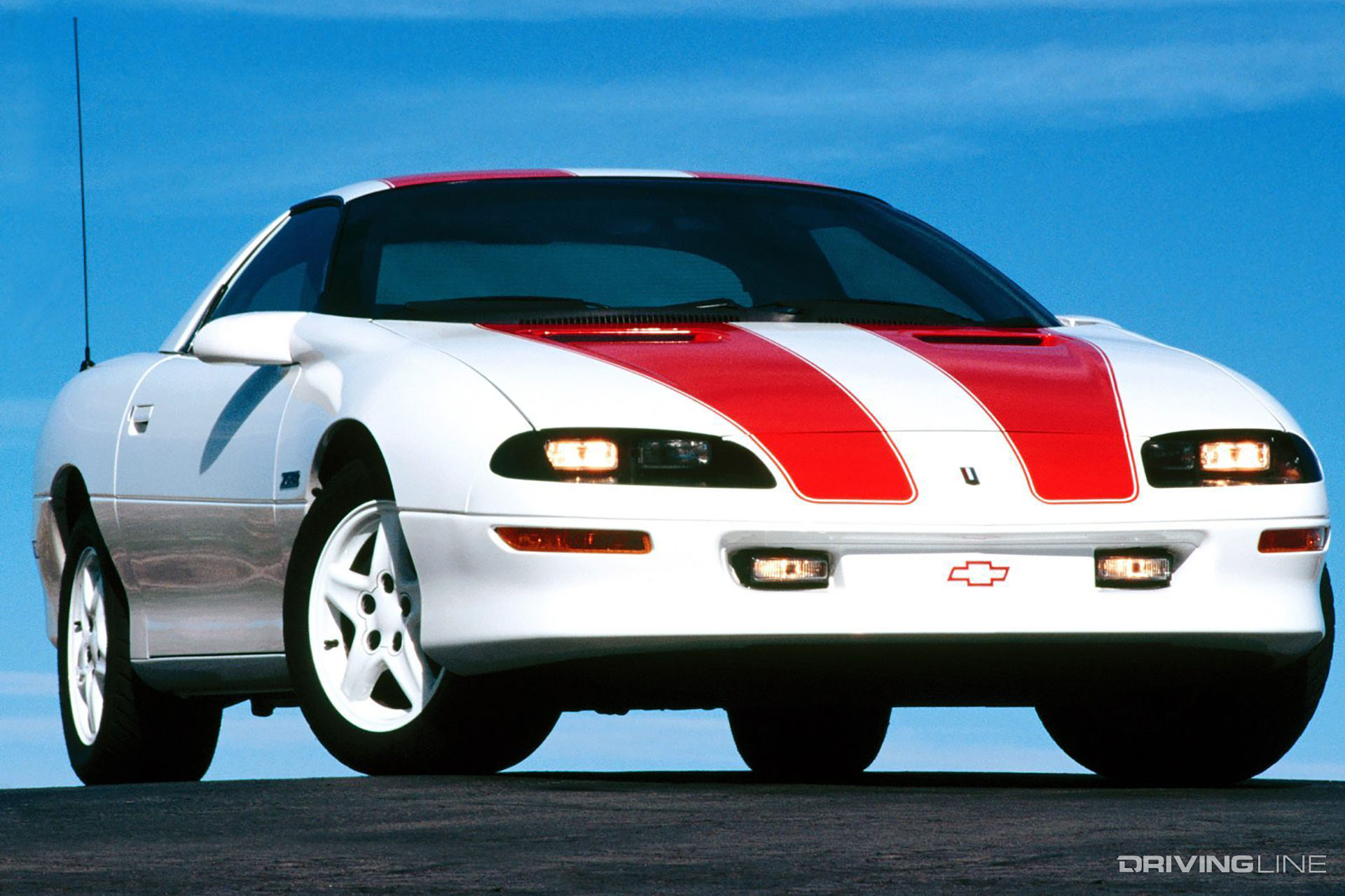 Chevy Camaro Z28 White with red stripes and white rims