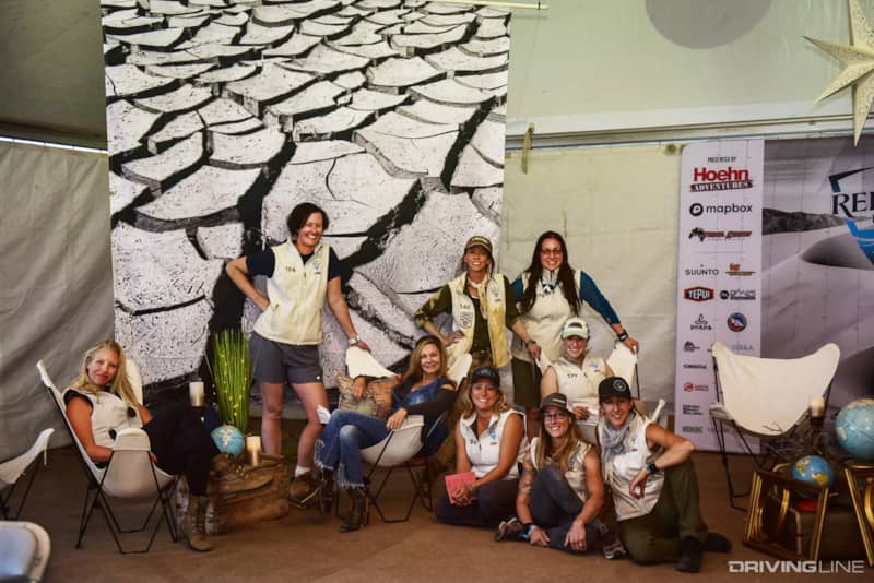 Rebelles having a quick break for a photo in the Rebelle Rally base camp