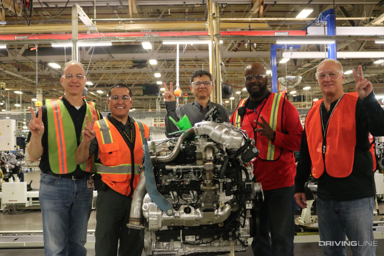 Workers standing around 2-Millionth Dmax-Ltd-L5P Duramax