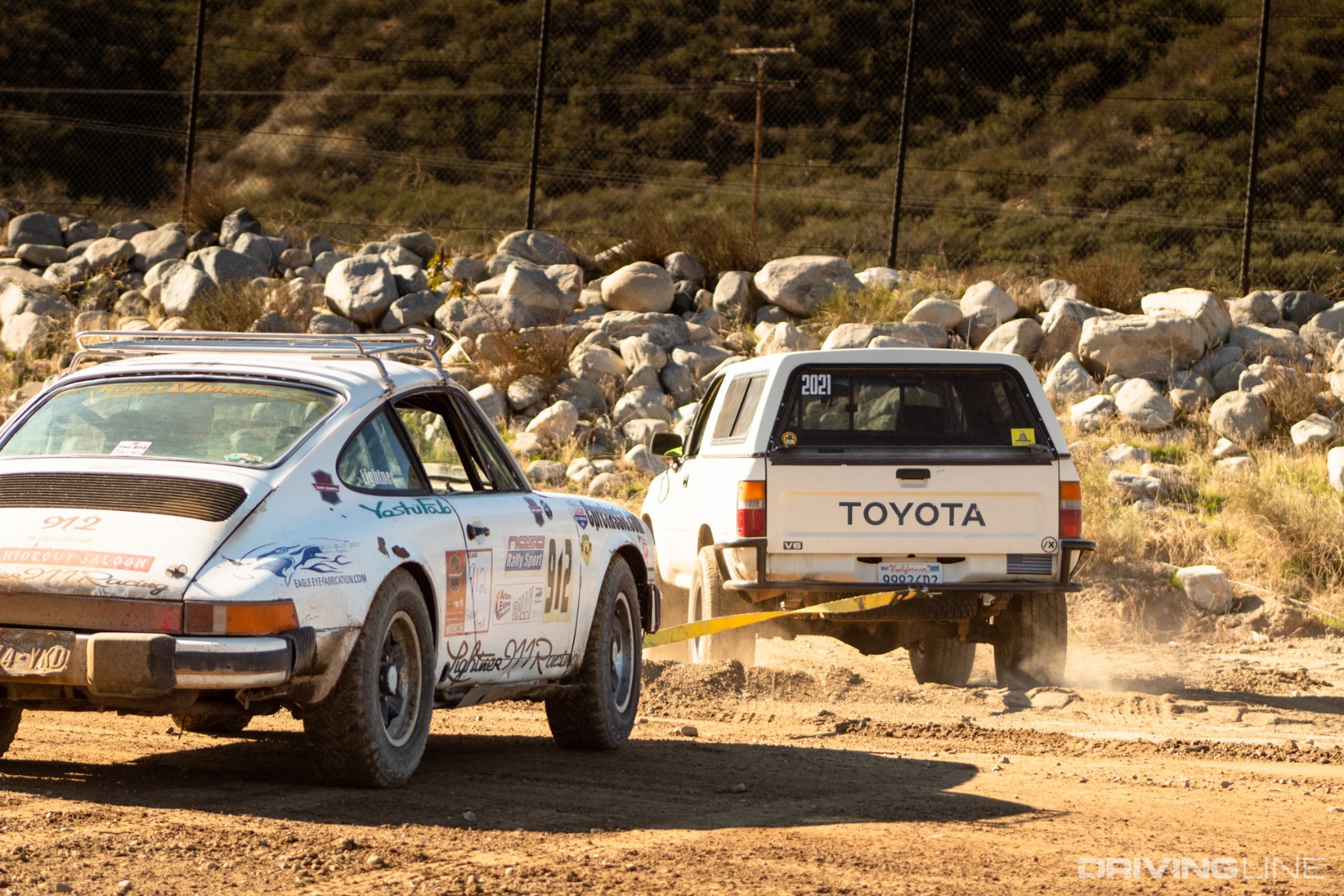Porsche being towed by Jump Champs staff