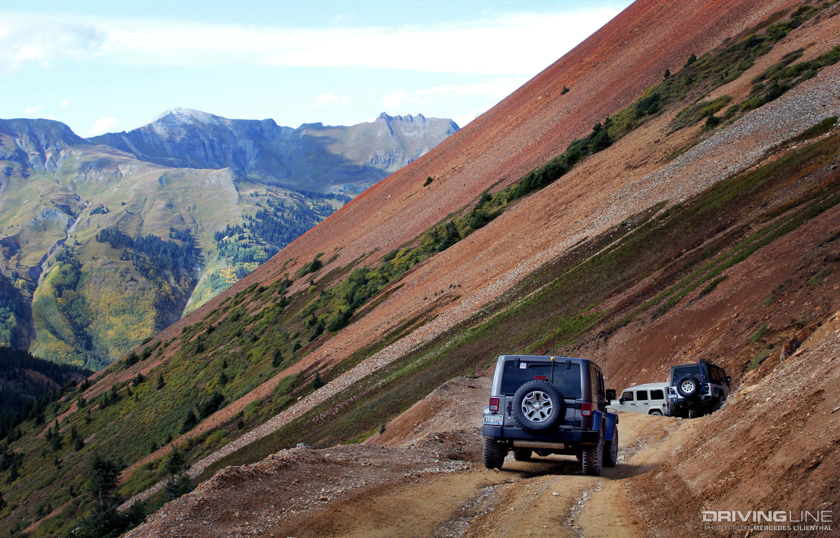 Jeeps clinging to mountainside near Corkscrew Pass
