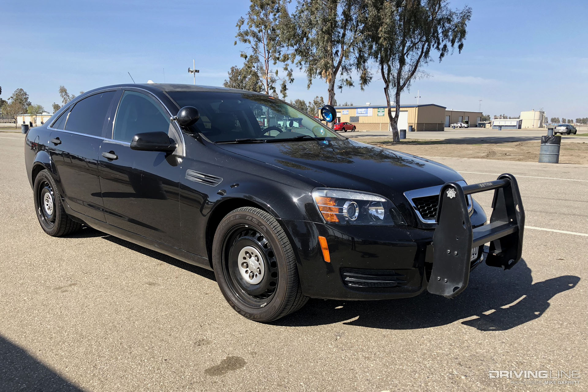 Chevy Caprice PPV Black Front Parking Lot