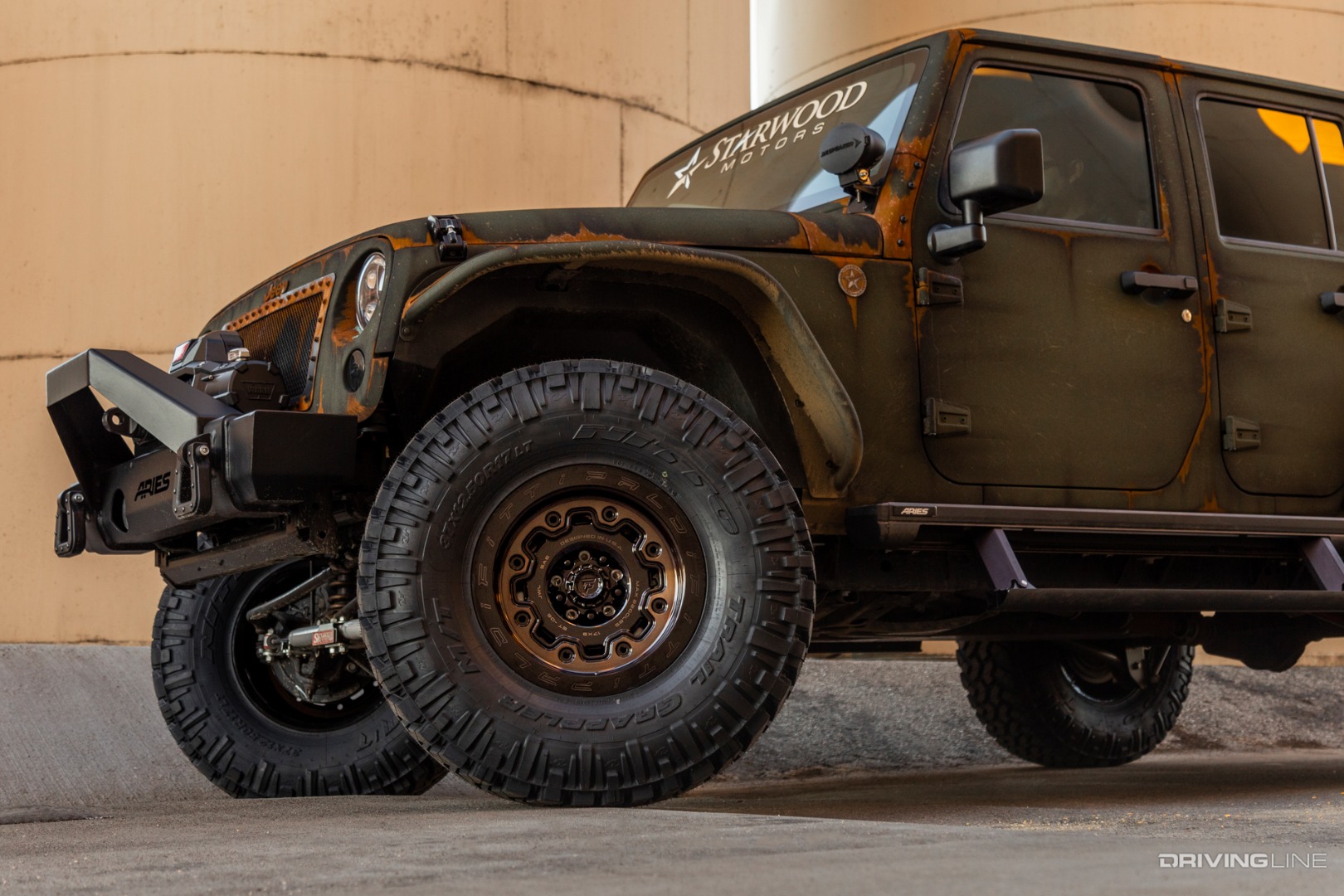 Starwood Motors Jeep JK on Nitto Trail Grappler tires front driver side