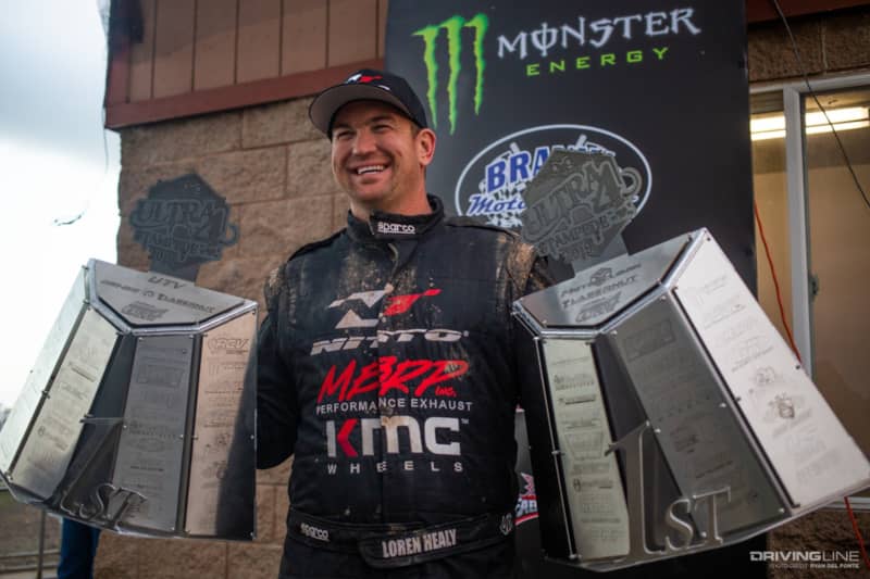 Loren Healy with UTV and 4400 Trophies at the 2019 Ultra4 MetalCloak Stampede