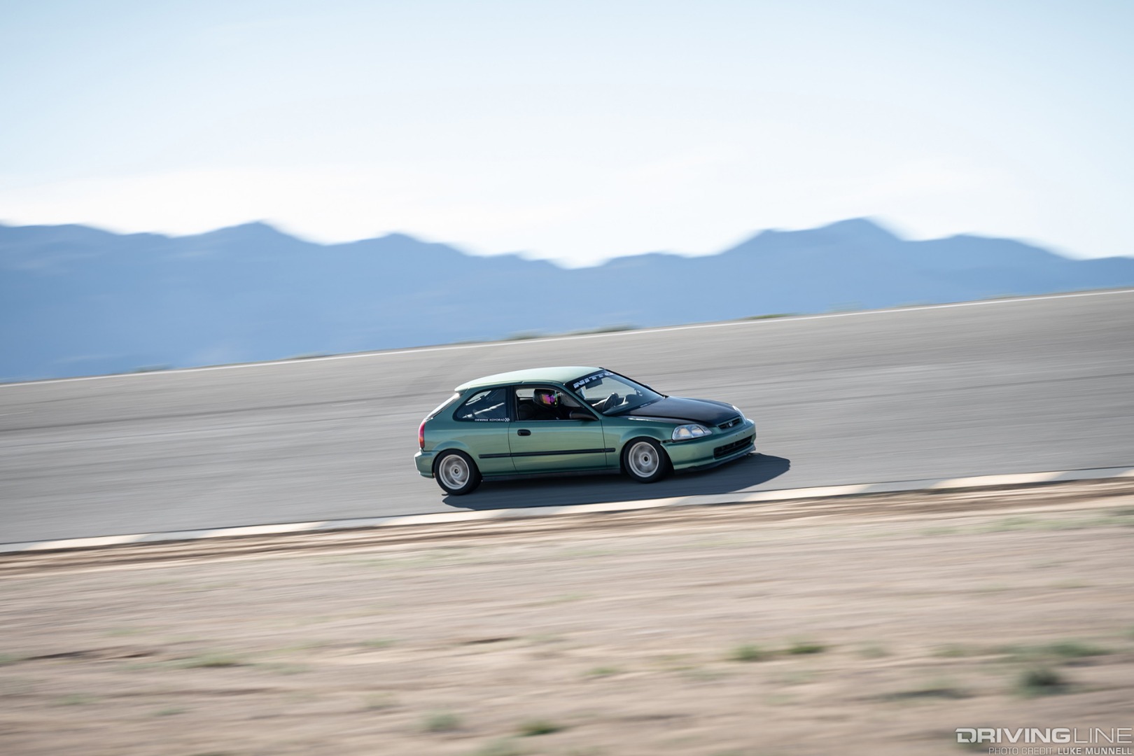 Driver Battles Honda Civic Hatchback