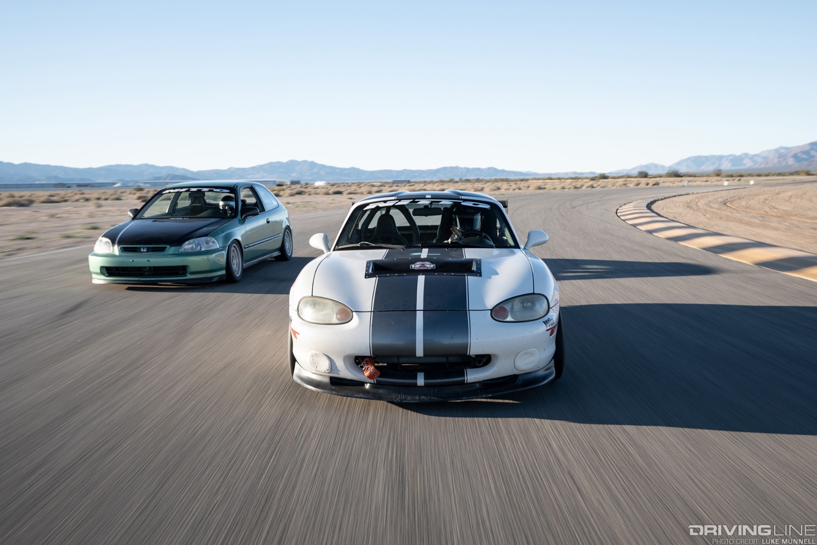 Driver Battles Mazda Miata and Honda Civic on the Track