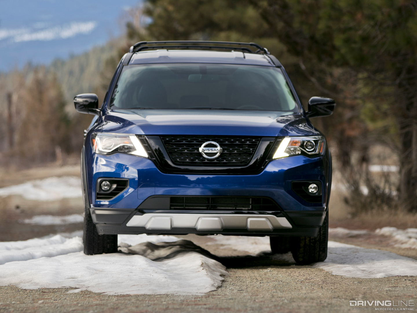 Front of Blue Nissan Pathfinder Rock Creek Edition