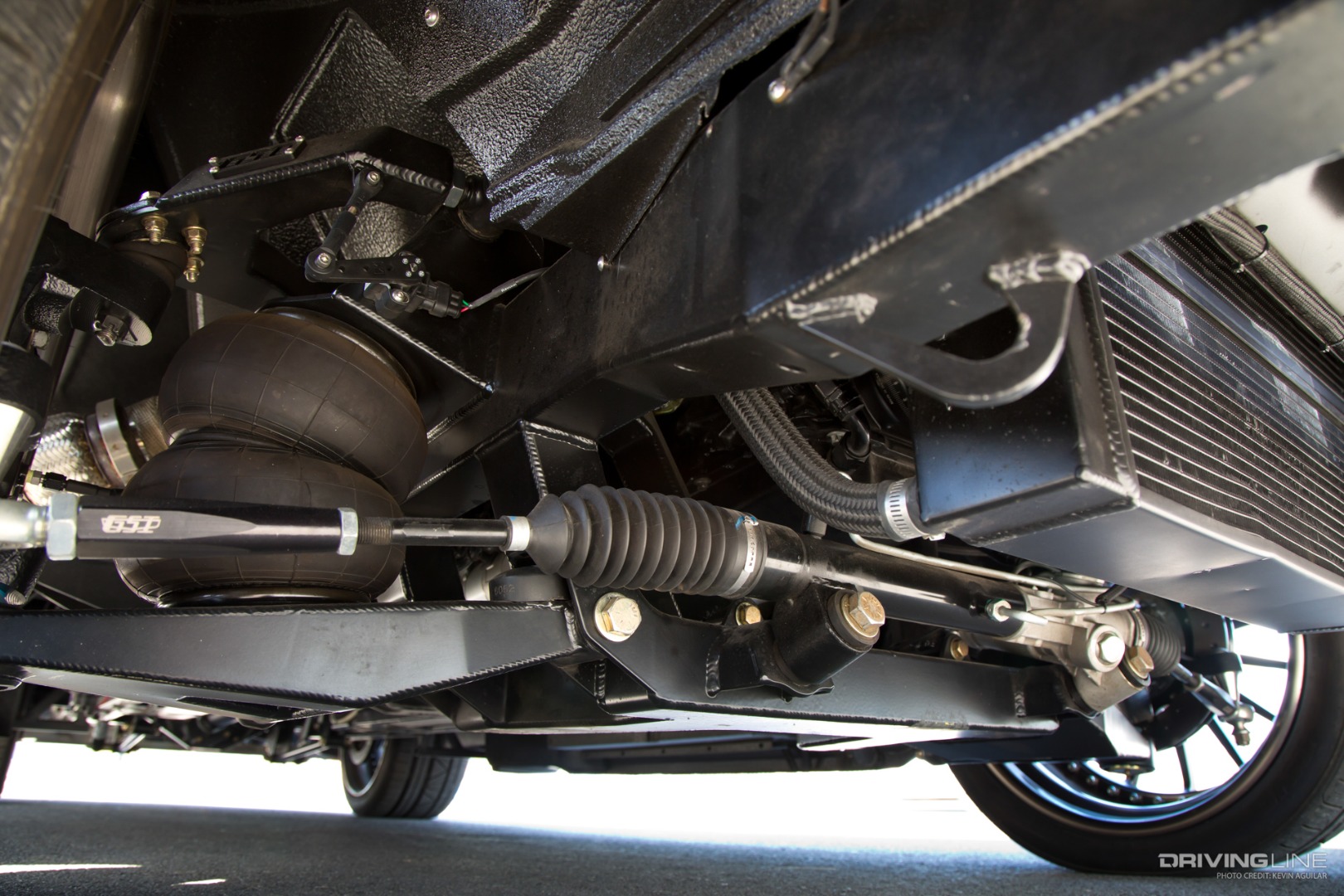 '56 Chevy Truck undercarriage showing custom independent front suspension and air bags