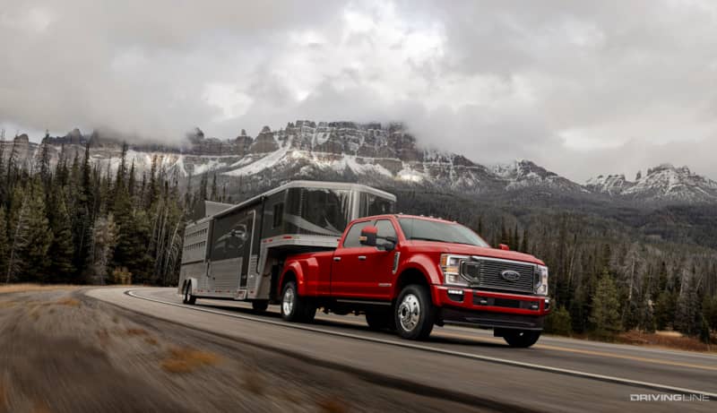 2020 Ford F450 Super Duty towing large trailer in the mountains